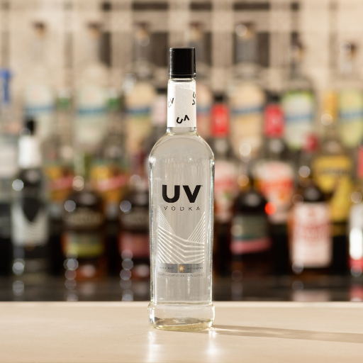Two bottles of UV Vodka on a bar